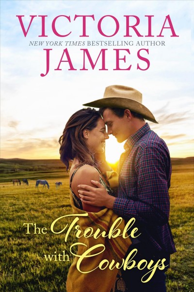 The trouble with cowboys / Victoria James.