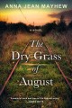 The dry grass of August Cover Image