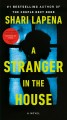 A stranger in the house  Cover Image